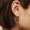 Pendientes dorados eslabones entrelazados - Imagen 2