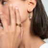 Anillo Kiss de acero e Ip dorado con una estrella colgante con circonita - Imagen 3